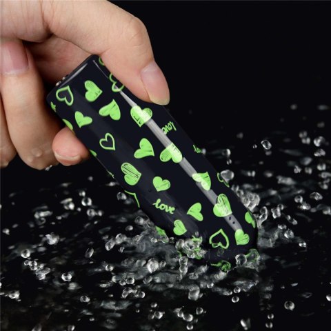 RECHARGEABLE GLOW-IN-THE-DARK HEART MASSAGER RECHARGEABLE GLOW-IN-THE-DARK HEART MASSAGER