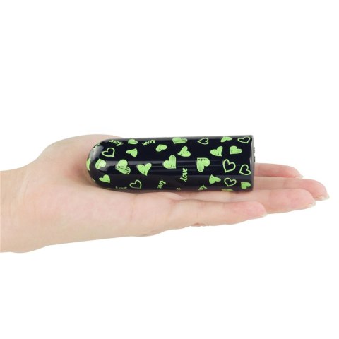 RECHARGEABLE GLOW-IN-THE-DARK HEART MASSAGER RECHARGEABLE GLOW-IN-THE-DARK HEART MASSAGER